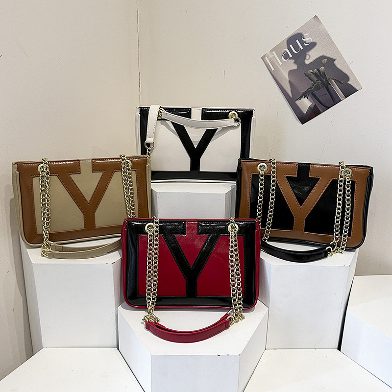 Free shipping designer bag 2025 New fashion patchwork Underarm Bag Women Temperament Commuter Bag casual Shoulder Bag PU Texture Chain Crossbody Bag