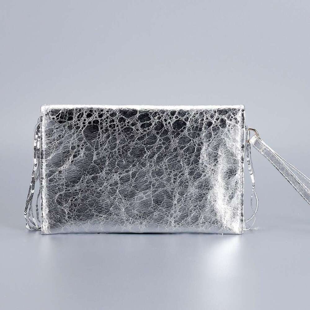 Tassel dinner bag new niche design fashionable women's bag high-end feeling woven straw handbag