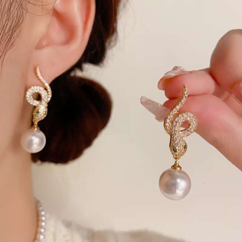 New Creative Personality High-end Design Copper Inlaid Zircon Snake Series Earrings Exquisite Light Temperament Simple Women