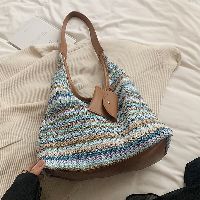 2025 Summer new women's shoulder crossbody bag large capacity hand woven fashionable commuting handbag vacation beach bag women's new design