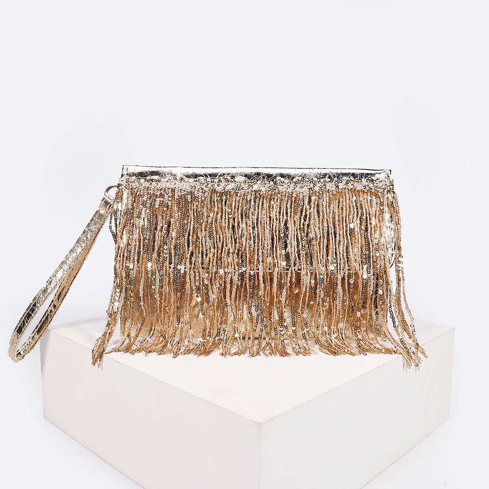 Tassel dinner bag new niche design fashionable women's bag high-end feeling woven straw handbag