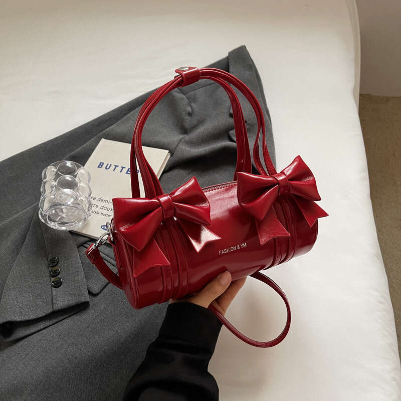 Super popular niche bow for women new single shoulder underarm versatile crossbody carrying cylindrical stick bag