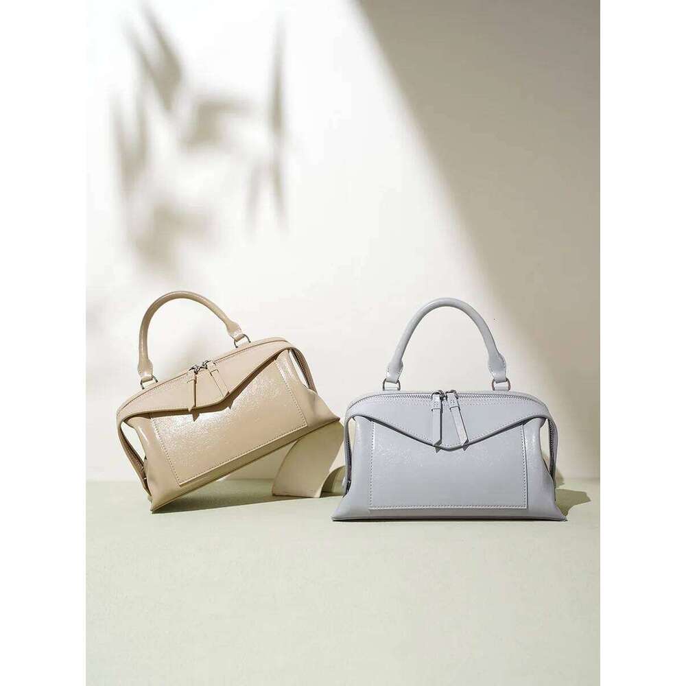 Crossbody women's pillow shoulder bag, leather high-end feeling, female office worker commuting handbag