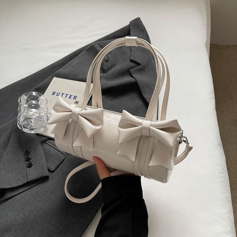 Super popular niche bow for women new single shoulder underarm versatile crossbody carrying cylindrical stick bag