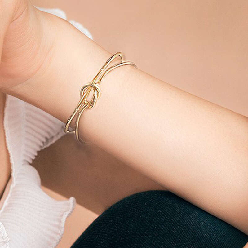 2025 Knotted Trendy Personality Versatile Gold and Sier Color Bracelet