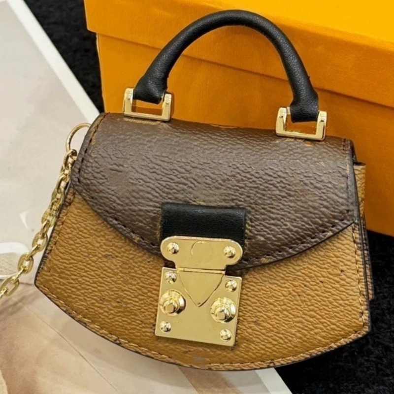 Fashion designer keychains vintage key chain designer bag charm mix color leather key ring plated gold metal buckle small coin purse car accessories faf232