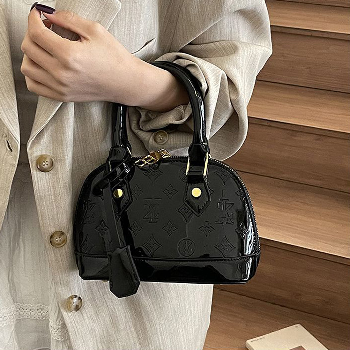 Light luxury Fashionable female Advanced printed retro light luxury hand-held vintage flower shell bag new versatile and temperament crossbody bag sho