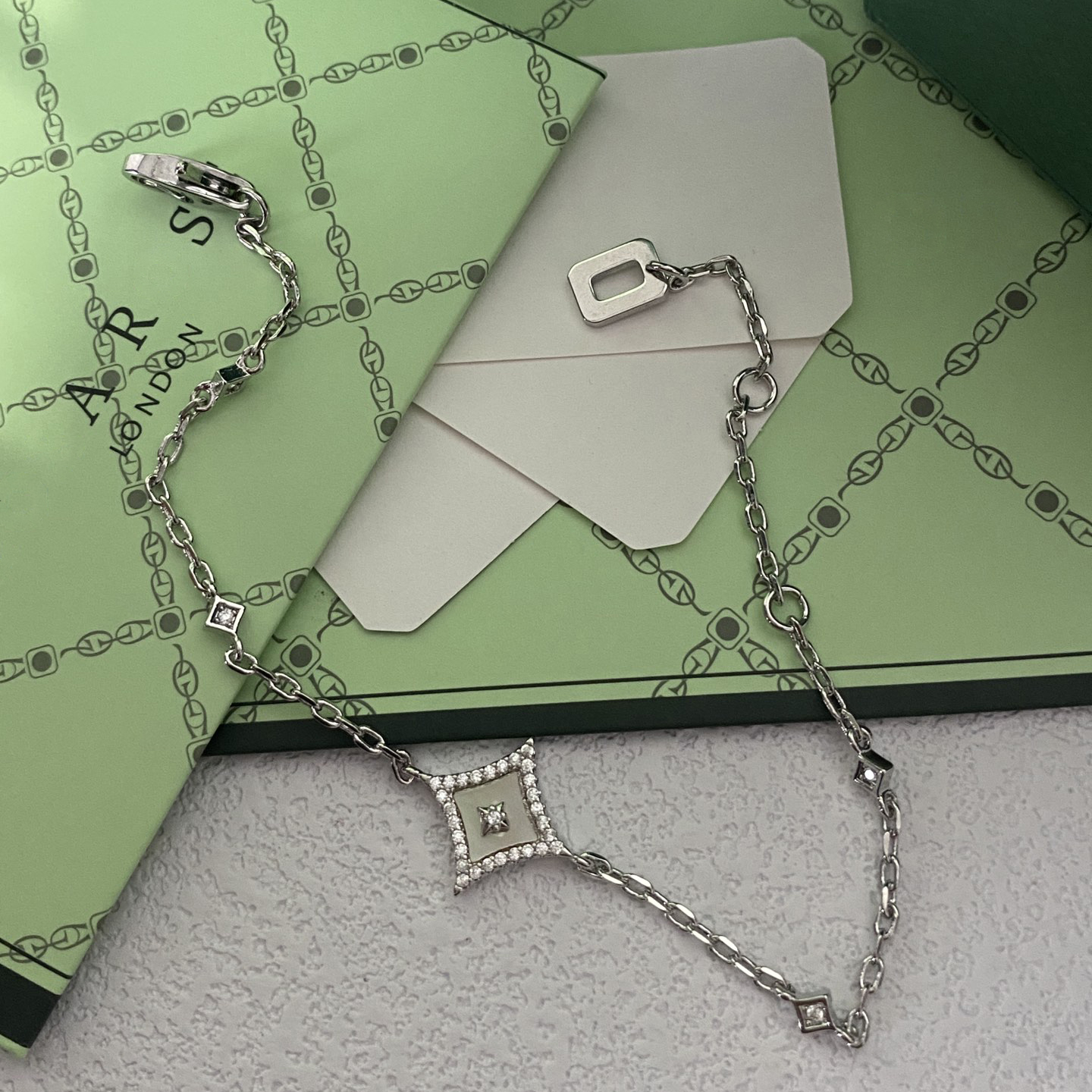 Silver - Toned Bracelet With Black Enamel, Rhinestone Halo, And Star Detail Stylish Daily & Party Jewelry Gift For Her High - Quality And Elegant Acce