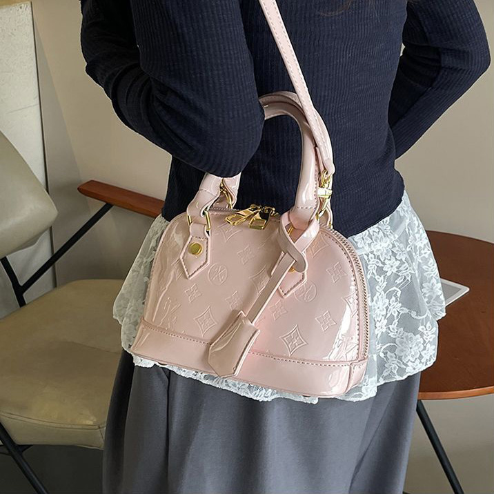 Light luxury Fashionable female Advanced printed retro light luxury hand-held vintage flower shell bag new versatile and temperament crossbody bag sho