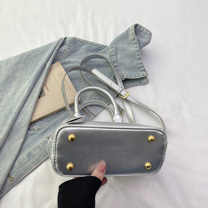 Light luxury Fashionable female Advanced printed retro light luxury hand-held vintage flower shell bag new versatile and temperament crossbody bag sho