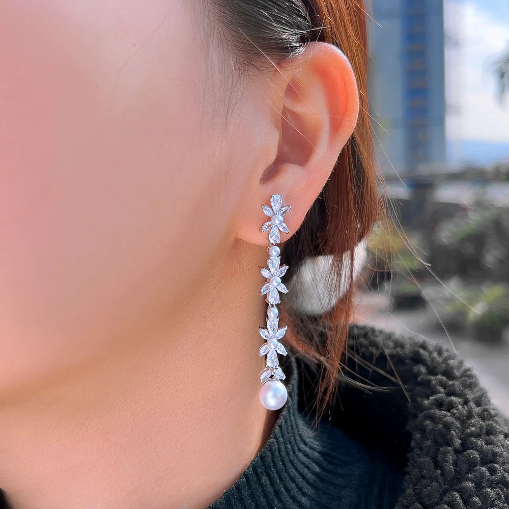 CWWZircons Shiny White CZ Paved Silver Color Long Dangle Drop Pearl Flower Leaf Cubic Zirconia Earrings for Women Wedding CZ478 250716