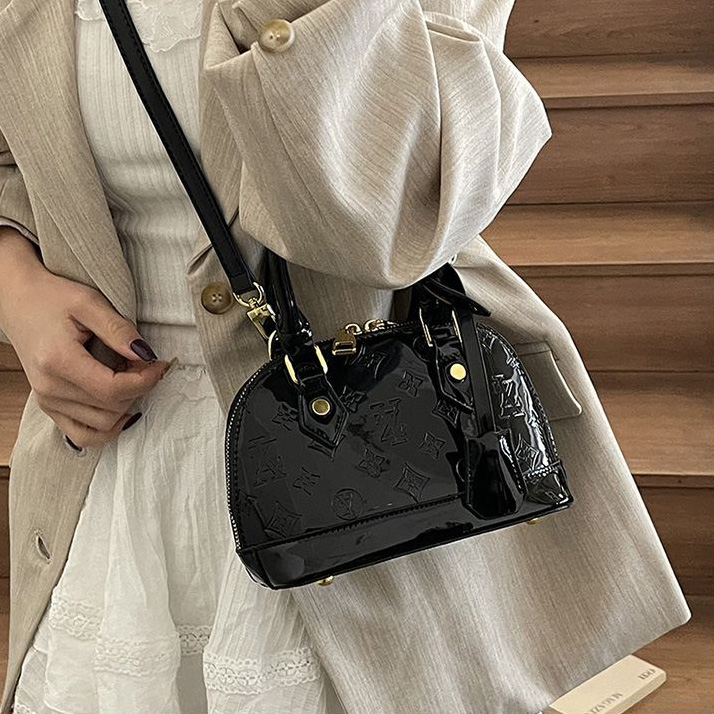 Light luxury Fashionable female Advanced printed retro light luxury hand-held vintage flower shell bag new versatile and temperament crossbody bag sho
