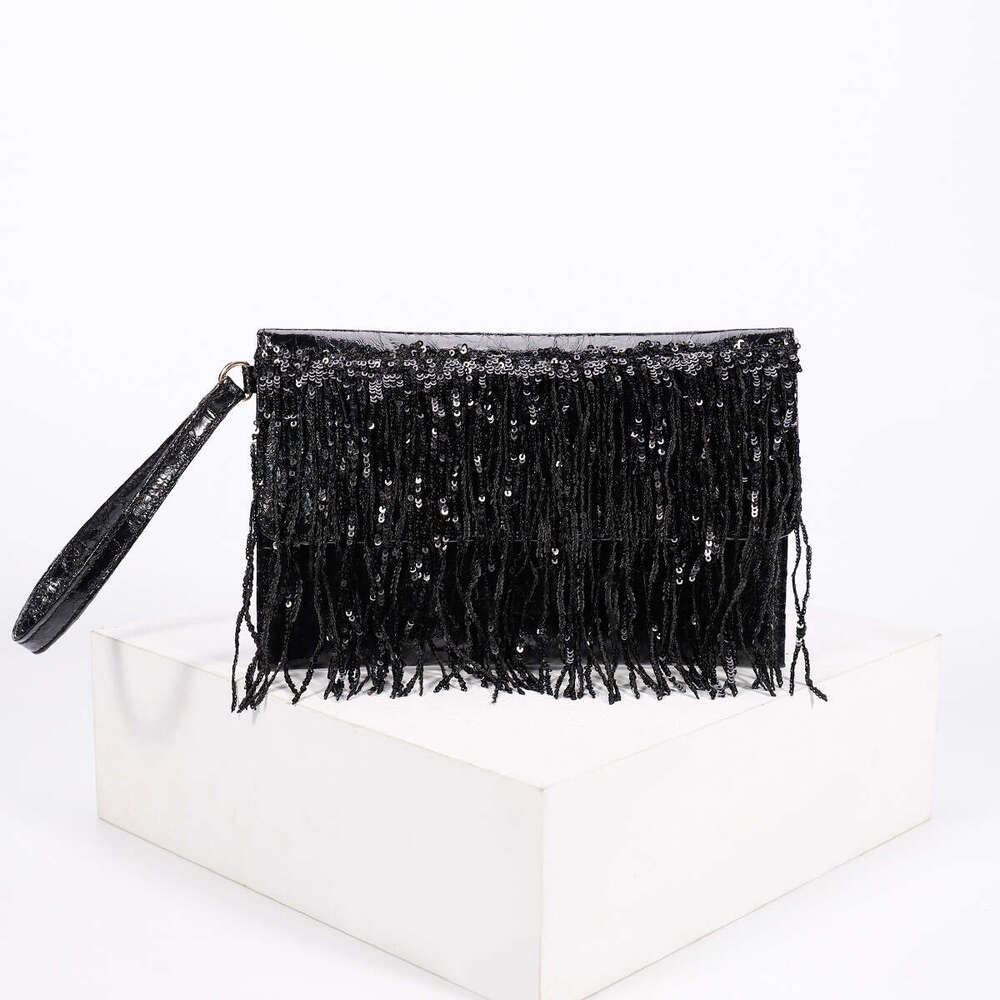 Tassel dinner bag new niche design fashionable women's bag high-end feeling woven straw handbag