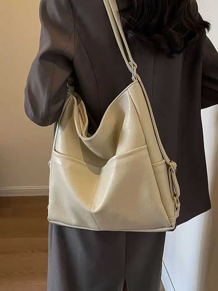 2025 New Autumn Winter Mens Bag Fi Versatile Solid Color Single Shoulder Bags Simple Commuter Large Capacity PU Backpack Y250718