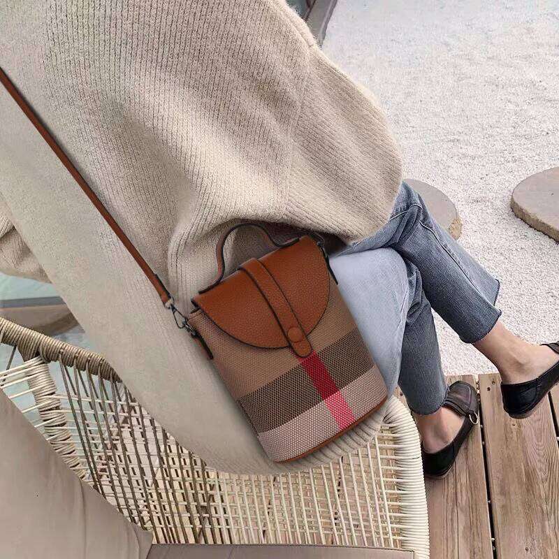 Aidrani Fashionable women's mini plaid single shoulder crossbody bag, canvas patchwork cowhide portable small bag