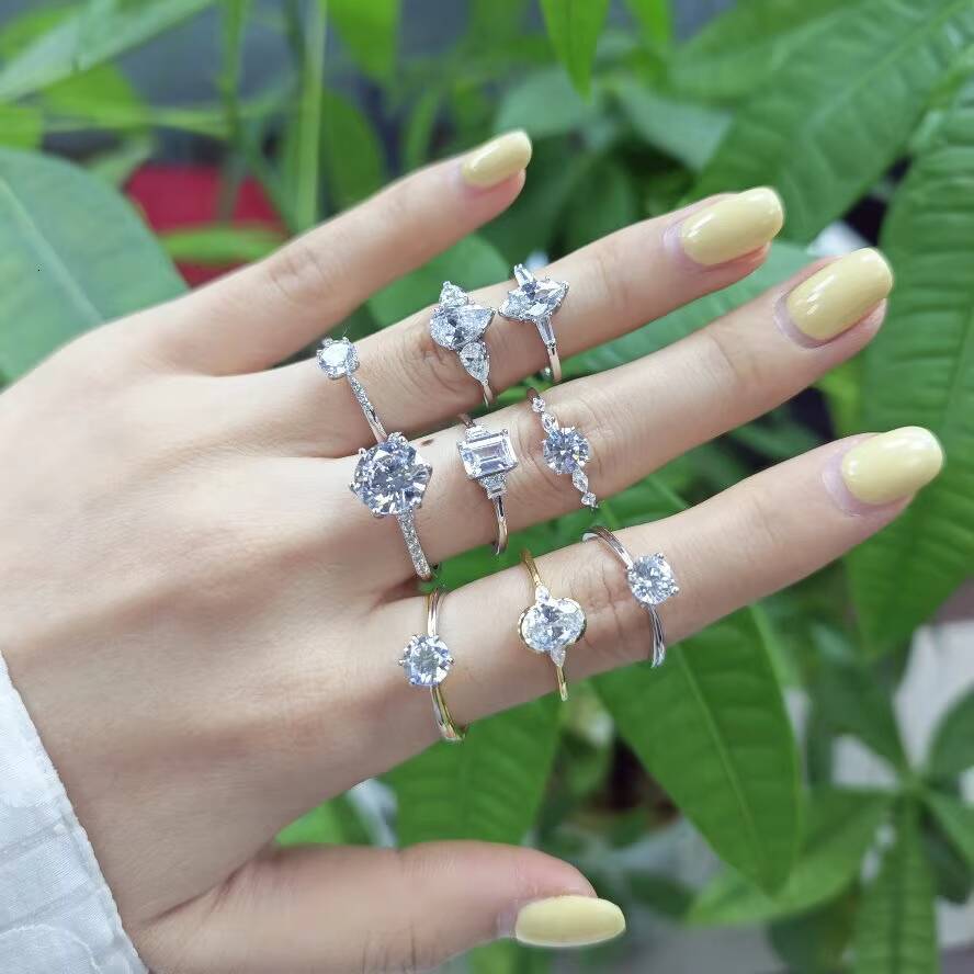 925 Sterling Silver Rhodium Plated Marquise-Cut Moissanite Engagement Ring with Baguette Moissanite Accent