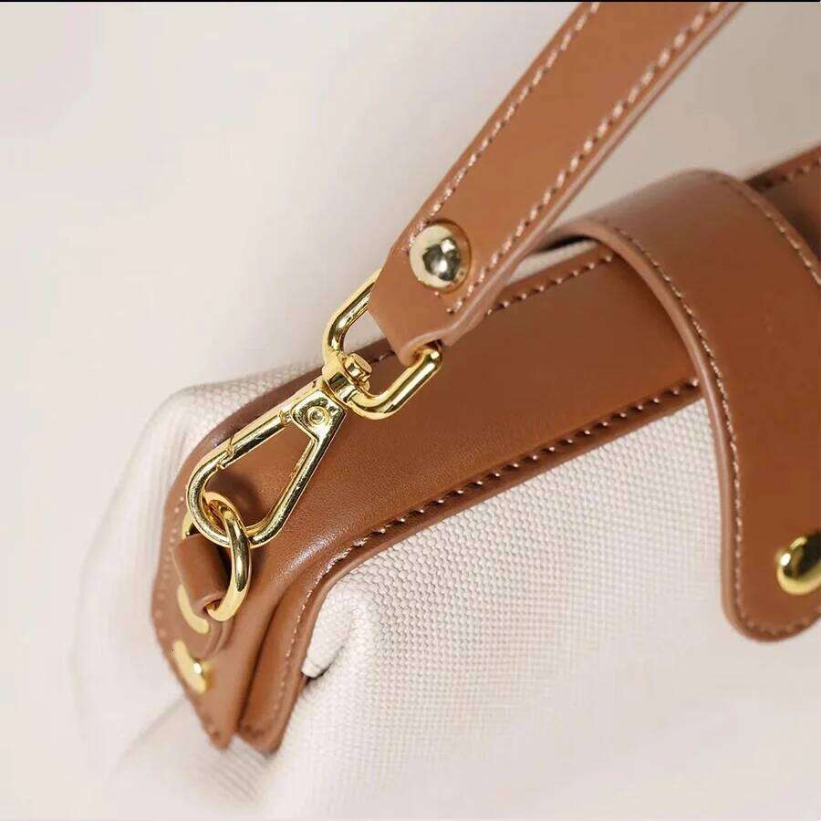 High quality canvas women's clip shell shoulder summer 2025 new hasp patchwork sewing thread makeup travel crossbody bag