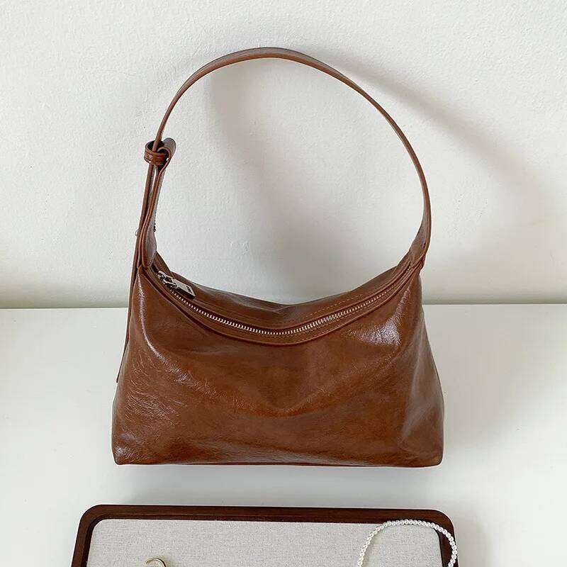 Designer Bag Luxury Bag Compact Ladies' Crossbody Satchel Featuring a Functional Zipped Pocket for On-the-go Essentials