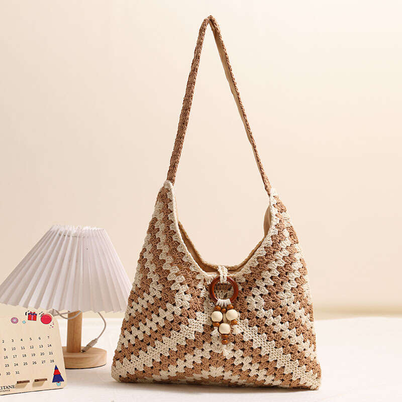 Hot Selling Hollow Out Single Shoulder Cotton Woven New Tassel Straw Vacation Style Beach Versatile Women's Bag