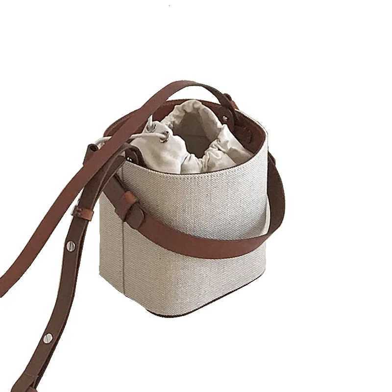 Summer Autumn New Canvas Splicing Leather Drawstring Bucket Bag Women Fashion Contrast Small Bag Single Shoulder Crossbody Bag Y250719