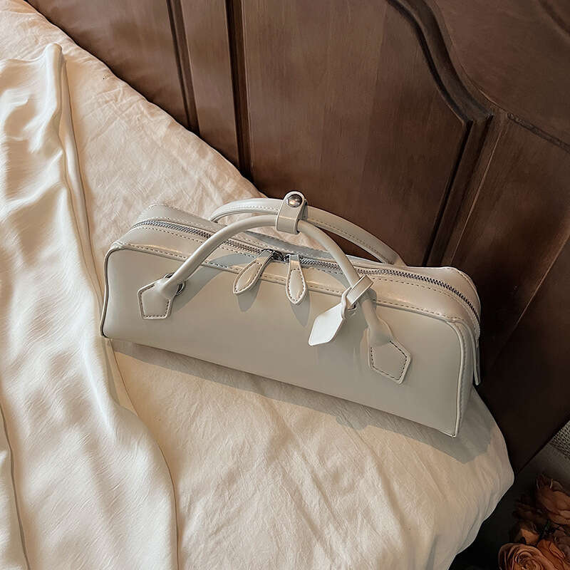 Simple Handheld Boston for Women 2025 Summer High-End Fashionable Commuter Shoulder Crossbody Bag