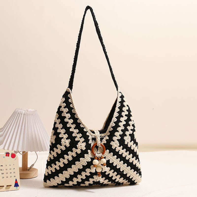 Hot Selling Hollow Out Single Shoulder Cotton Woven New Tassel Straw Vacation Style Beach Versatile Women's Bag