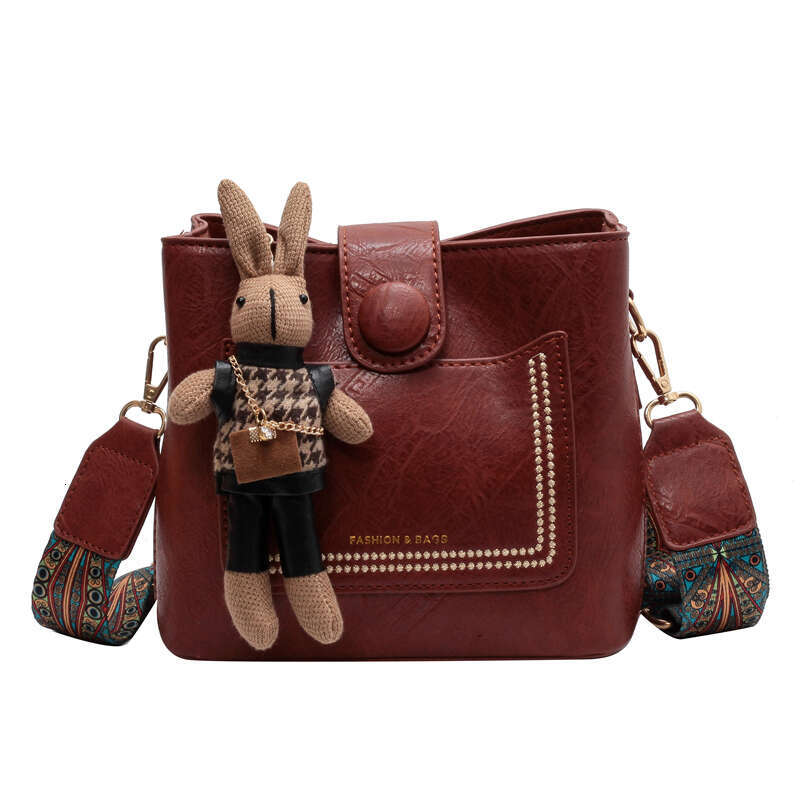 Niche Korean Retro Spring Summer Versatile Commuter Wide Strap Crossbody for Women New High-end Bucket Bag