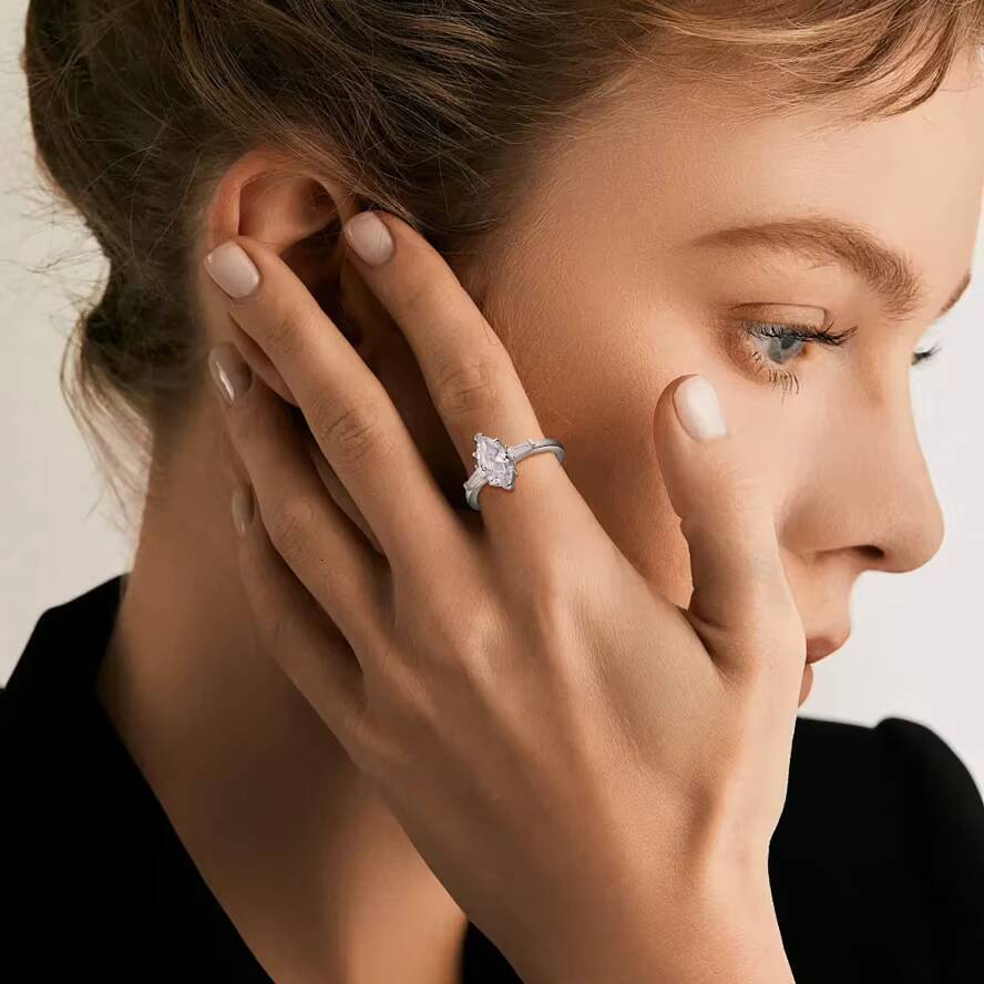 925 Sterling Silver Rhodium Plated Marquise-Cut Moissanite Engagement Ring with Baguette Moissanite Accent