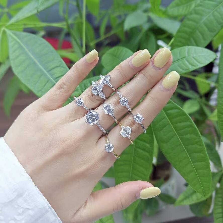 925 Sterling Silver Rhodium Plated Marquise-Cut Moissanite Engagement Ring with Baguette Moissanite Accent