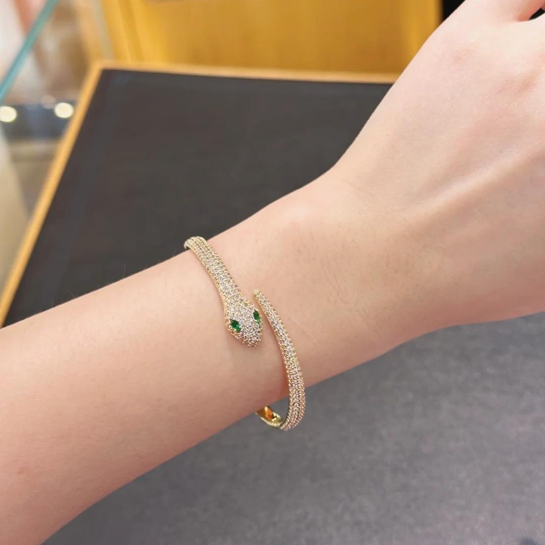 Silver Tone Snake Shaped Cuff Bracelet Pave Crystal Body & Green Gemstone Eyes Edgy Luxurious Party Jewelry And Gift For Her High Quality Stylish Desi