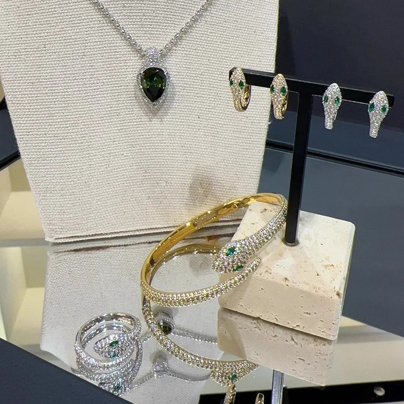 Silver Tone Snake Shaped Cuff Bracelet Pave Crystal Body & Green Gemstone Eyes Edgy Luxurious Party Jewelry And Gift For Her High Quality Stylish Desi