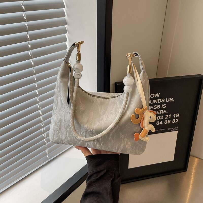 Texture PU leather armpit bag, cute pony pendant embellishment, perfect for commuting and dating, both shoulder and crossbody