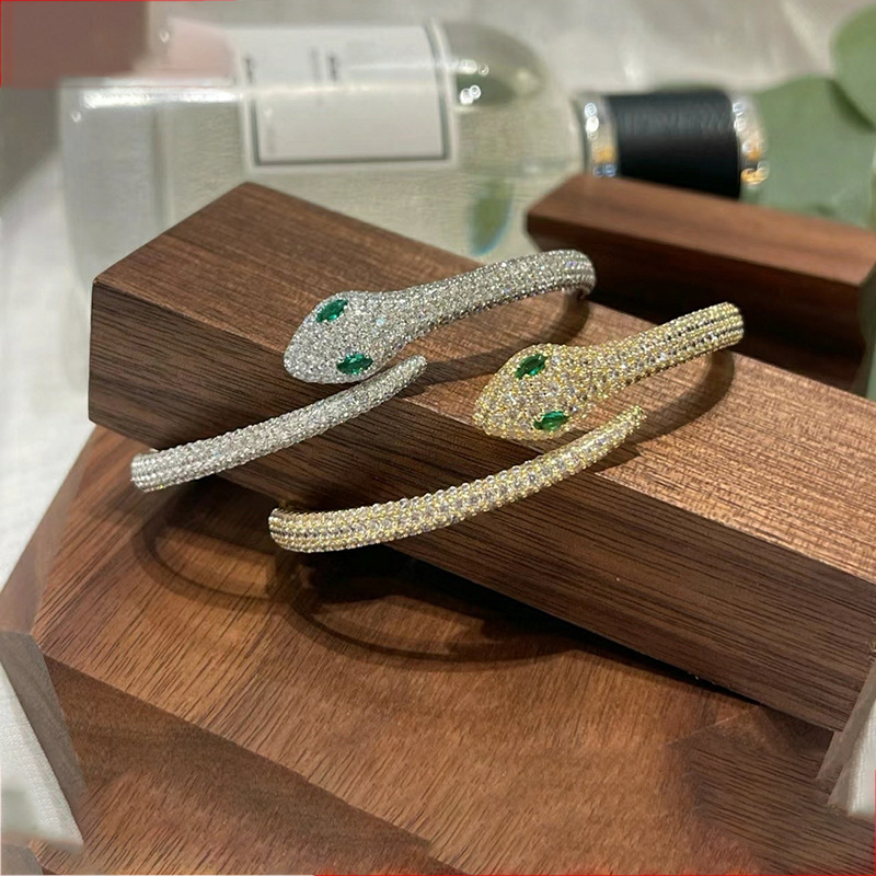 Silver Tone Snake Shaped Cuff Bracelet Pave Crystal Body & Green Gemstone Eyes Edgy Luxurious Party Jewelry And Gift For Her High Quality Stylish Desi