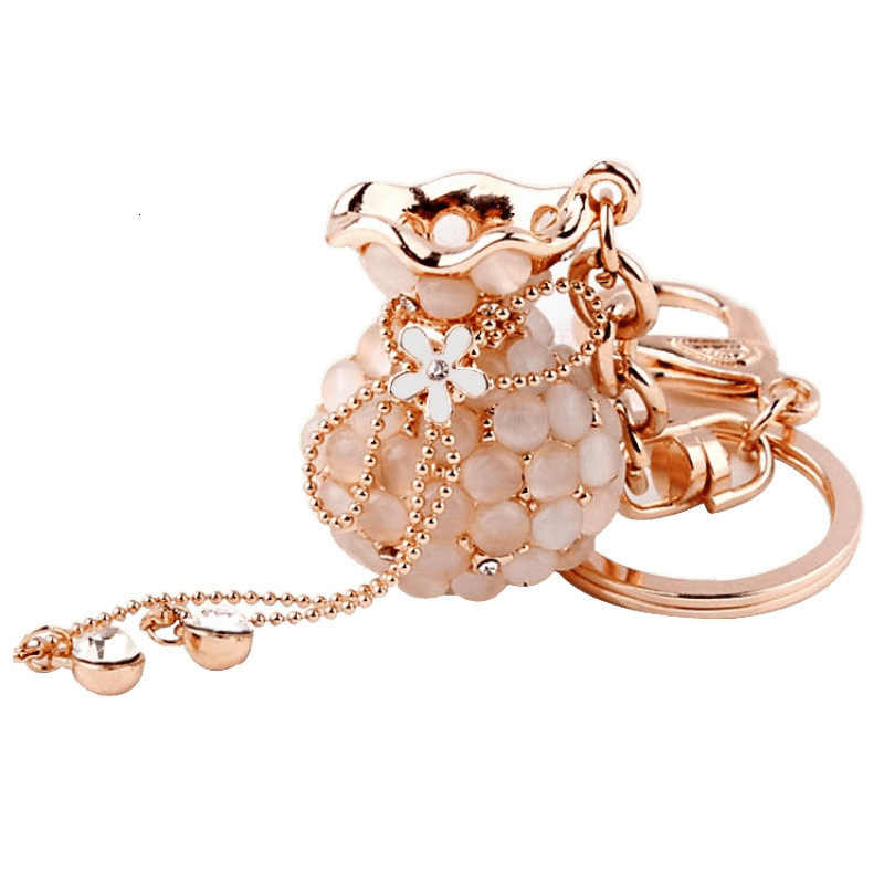 Money Bag Cat's Eye Stone Tassel Rhinestone Version Korean Women's Creative Crystal Car Keychain Key Ring Hanging Car accessories