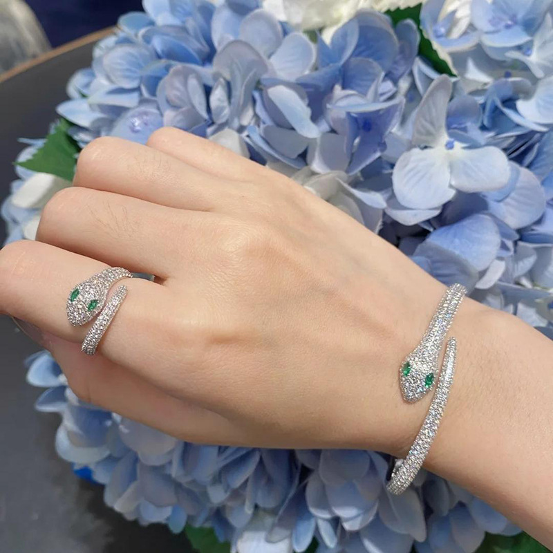 Silver Tone Snake Shaped Cuff Bracelet Pave Crystal Body & Green Gemstone Eyes Edgy Luxurious Party Jewelry And Gift For Her High Quality Stylish Desi