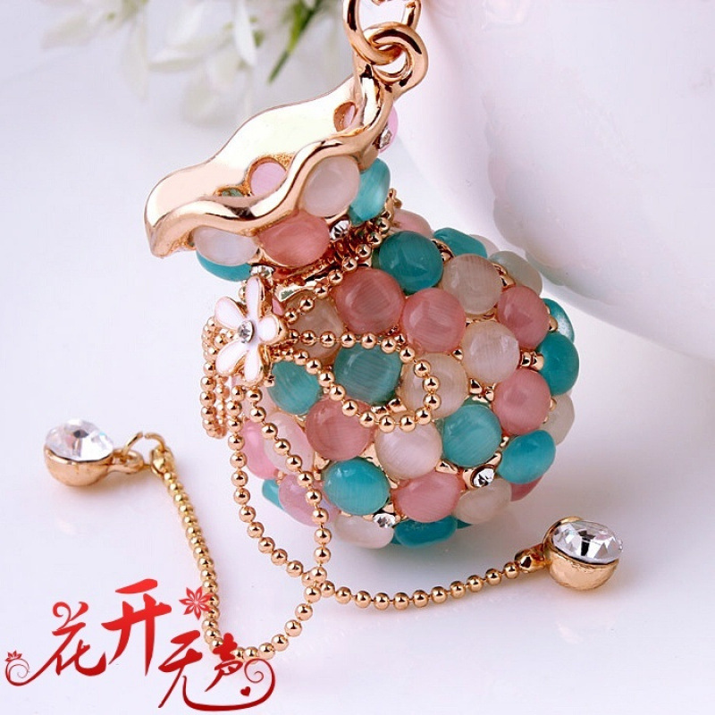 Money Bag Cat's Eye Stone Tassel Rhinestone Version Korean Women's Creative Crystal Car Keychain Key Ring Hanging Car accessories