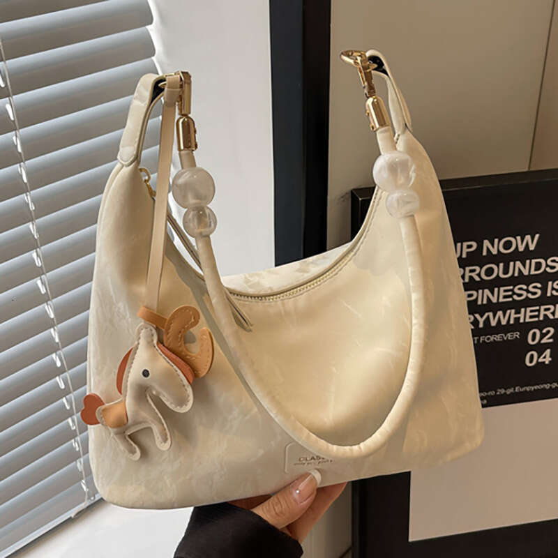 Texture PU leather armpit bag, cute pony pendant embellishment, perfect for commuting and dating, both shoulder and crossbody