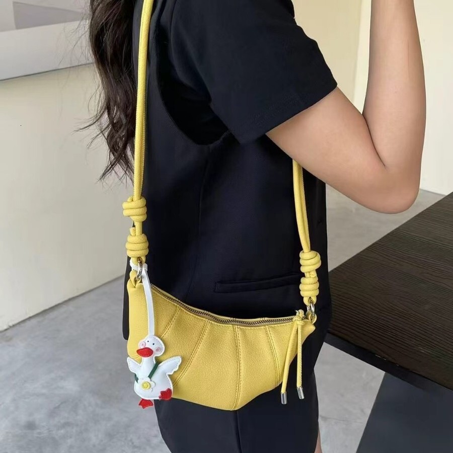 Free shipping designer bag 2025 Niche Fashionable Solid Color Horn Bag For Women New Simple Versatile Bag Shoulder Bag Crossbody Bag