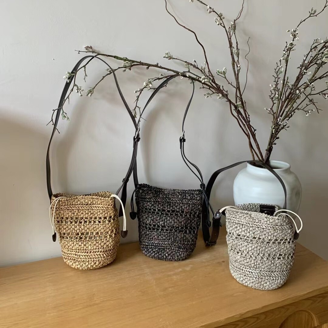 Free shipping designer bag 2025 French Style Summer Beach Raffia Bucket Bag For Women New Fashion Straw Woven Shoulder Bag Crossbody Phone Bag