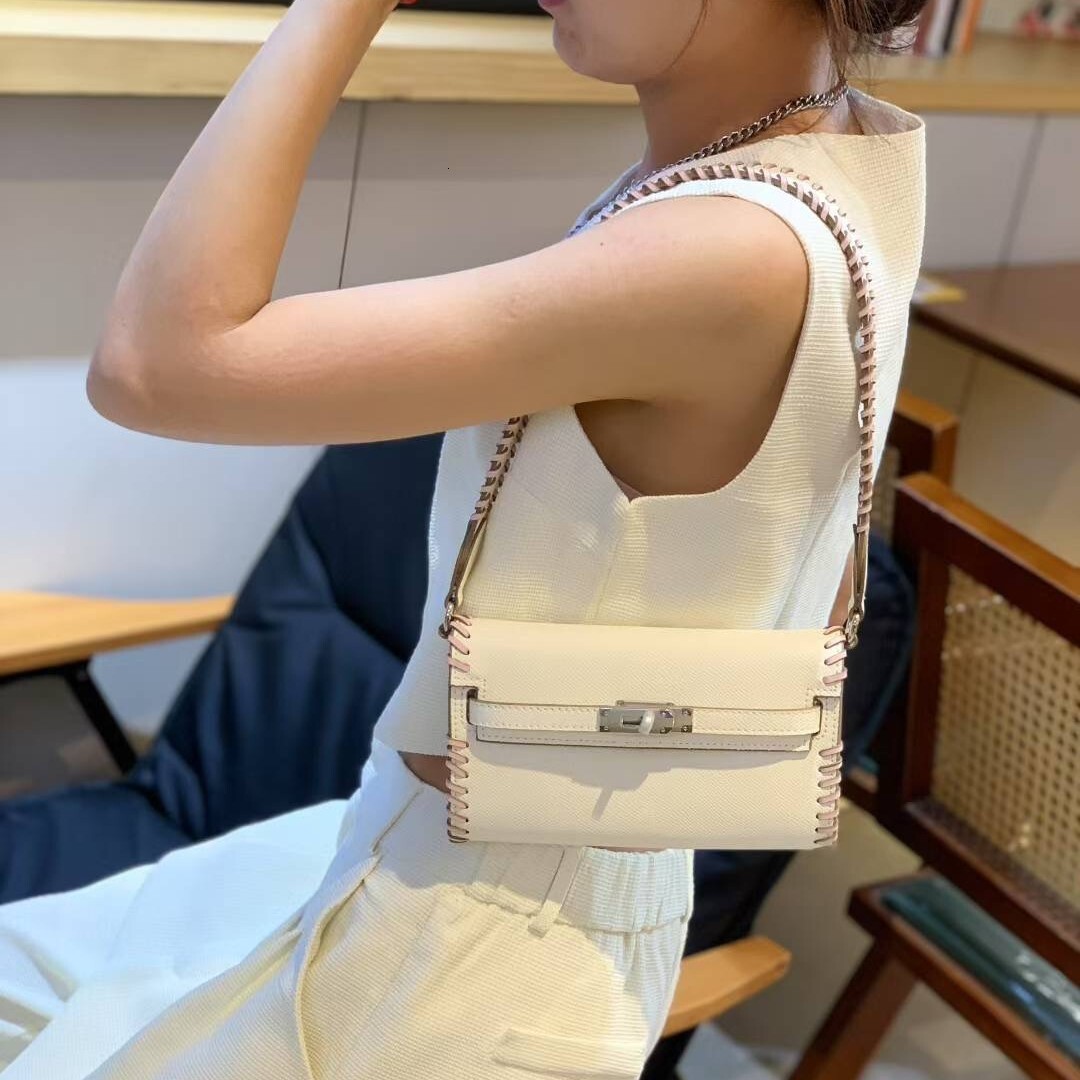 Free shipping designer bag 2025 High End Hand Woven Bag For Women New Lock Buckle Fashion Wide Shoulder Strap Underarm Single Shoulder Bag Crossbody B