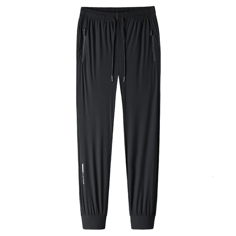 Mens solid color pants summer ice silk elastic quick drying loose sports pants suitable for casual and business wear M-8XL 250717