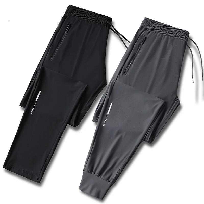 Mens solid color pants summer ice silk elastic quick drying loose sports pants suitable for casual and business wear M-8XL 250717
