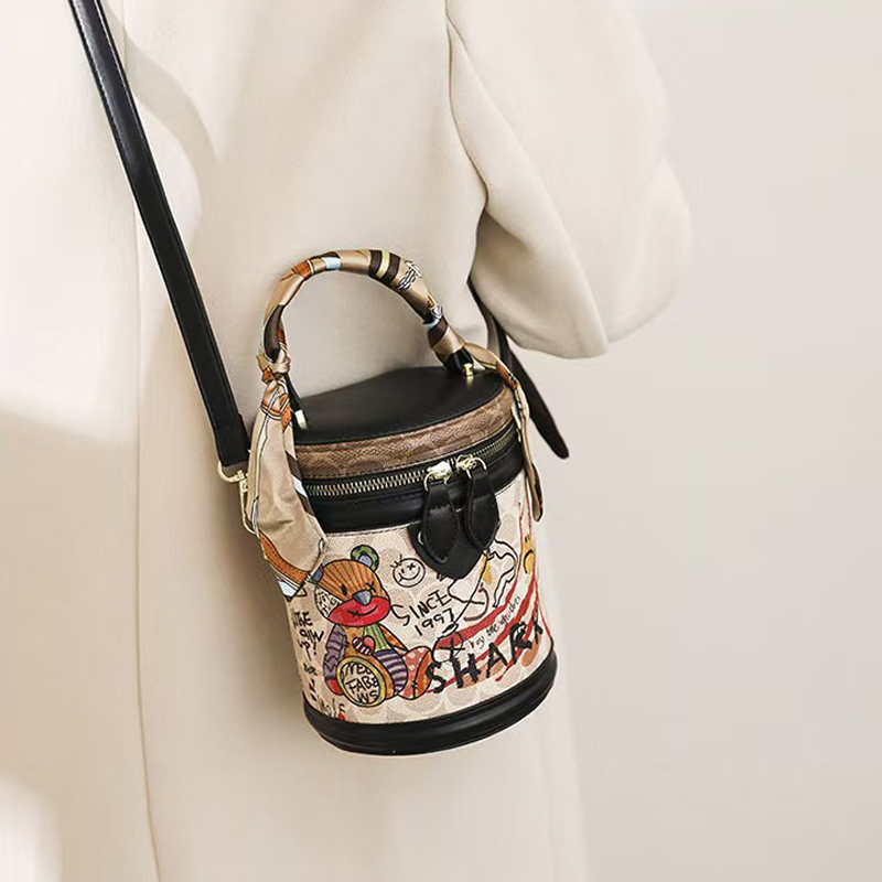 The hottest Designer Bag Shoulder Bag Luxury Bag Crossbody Purse Designer temperament graffiti cylindrical everything stylish single shoulder crossbod