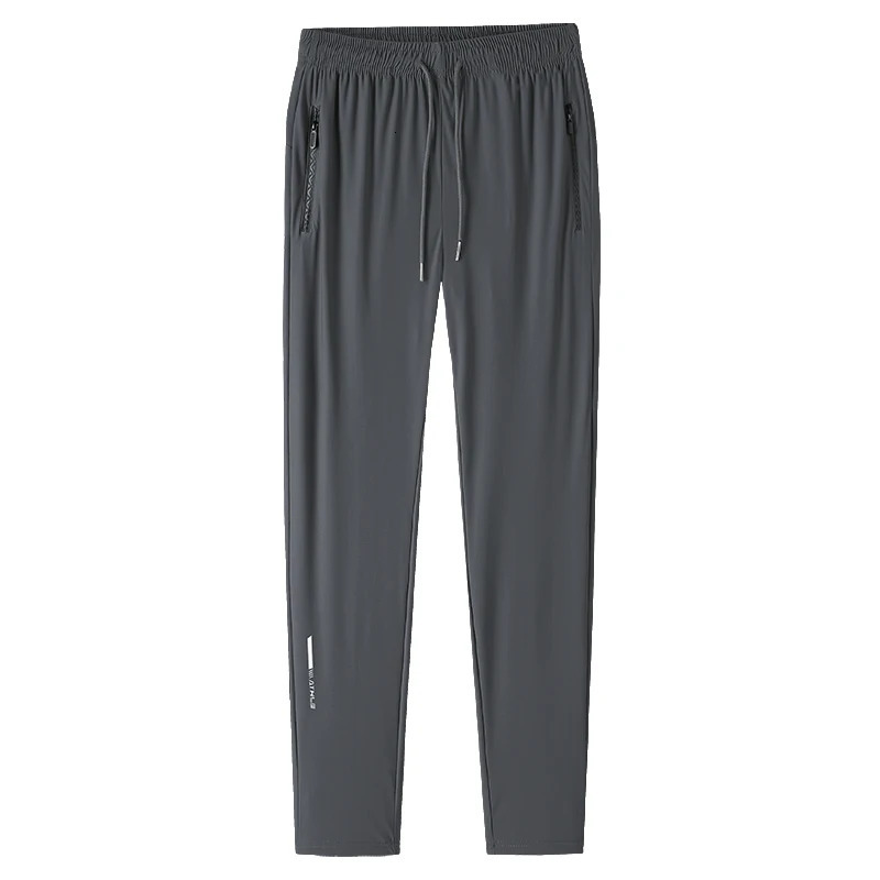 Mens solid color pants summer ice silk elastic quick drying loose sports pants suitable for casual and business wear M-8XL 250717