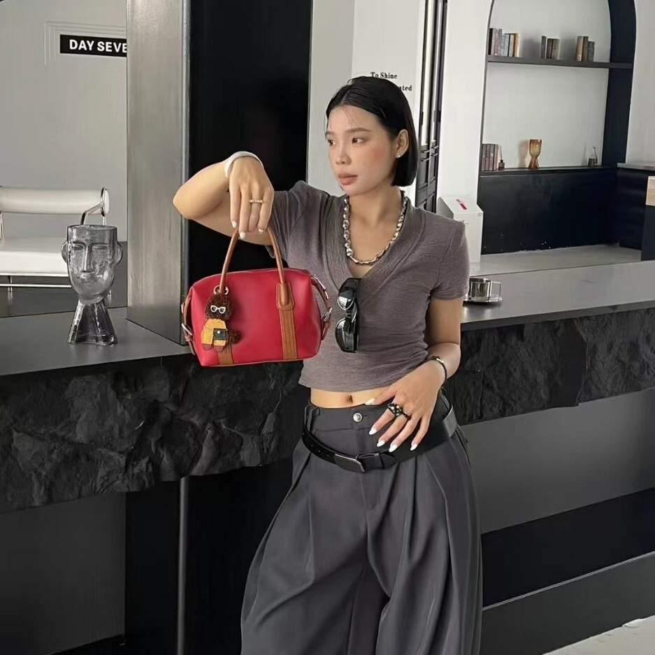 Free shipping designer bag 2025 Minimalist Boston Retro Handbag New Trendy Versatile Bag Fashion Bowling Ball Pillow Shoulder Bag Crossbody Bag