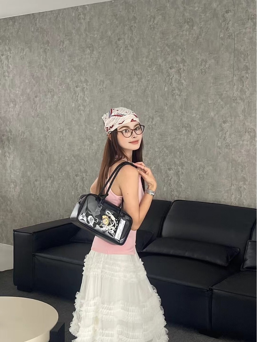 Free shipping designer bag 2025 Niche Underarm Long Handle Pain Bag New Fashion Boston Pillow Women S Bag Handbag Crossbody Bag