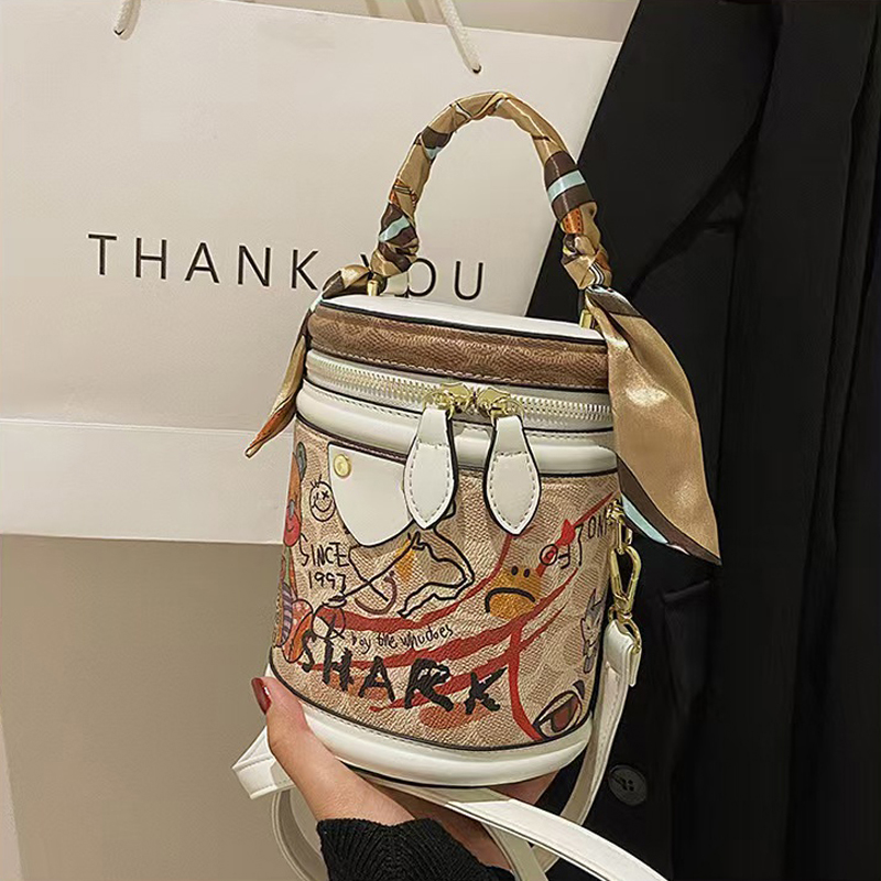 The hottest Designer Bag Shoulder Bag Luxury Bag Crossbody Purse Designer temperament graffiti cylindrical everything stylish single shoulder crossbod