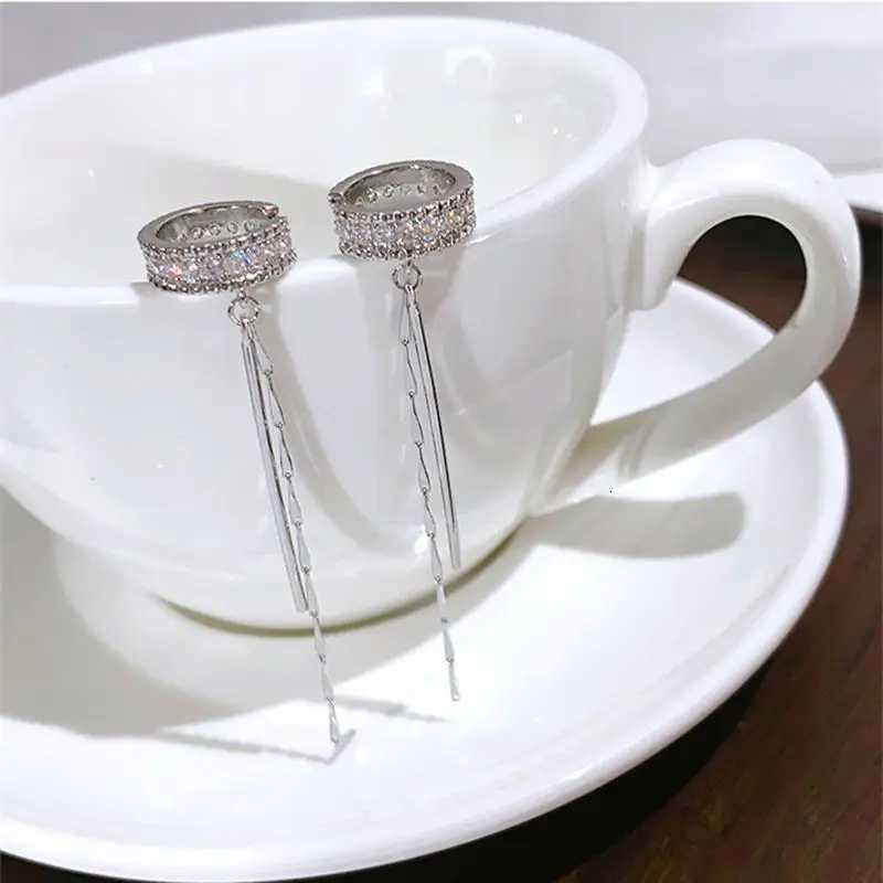 2025 New Fashion Zircon Shining C She Long Tassel Ear Cuff No Piercing Earrings Female Simple Design Ear Clip Party Jewelry XJ250722