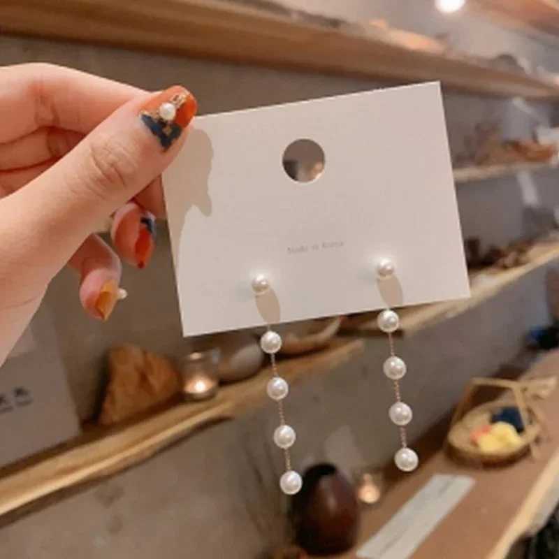 Earrings New Retro Long Pearl Earrings Chain Tassel Fashion Atmospheric Wedding Pendant Earrings for Women Elegant Ear Pendant XJ250722