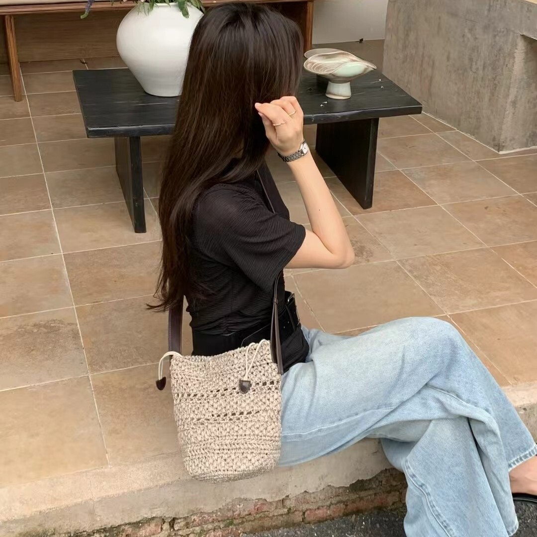 Free shipping designer bag 2025 French Style Summer Beach Raffia Bucket Bag For Women New Fashion Straw Woven Shoulder Bag Crossbody Phone Bag